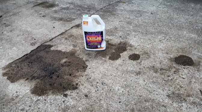 How to Clean Up Oil On A Cement Driveway