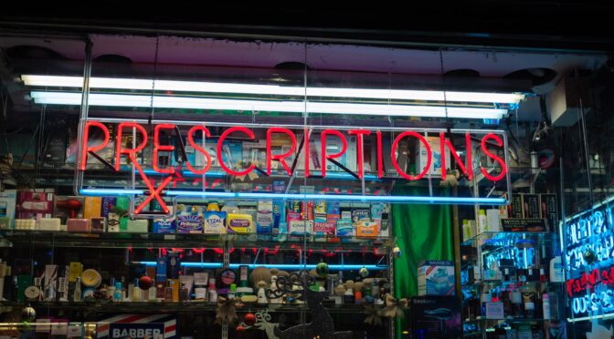 prescriptions sign on a drug store front