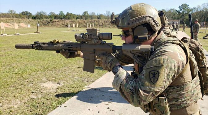 Soldier firing the XM157 Fire Control System at a target range as part of the NGSW-FC program.
