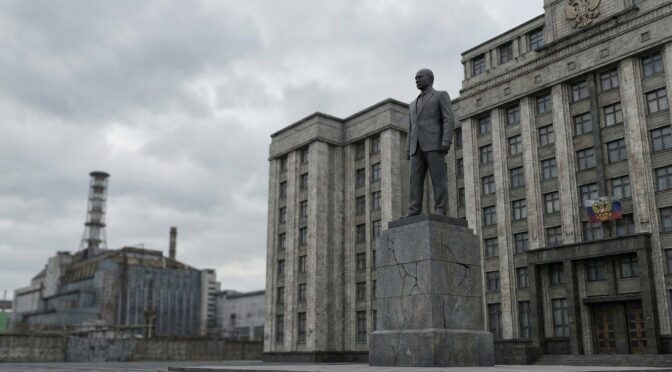 Lenin statue in front of a building with the Russian flag, Chernobyl power plant in the background.