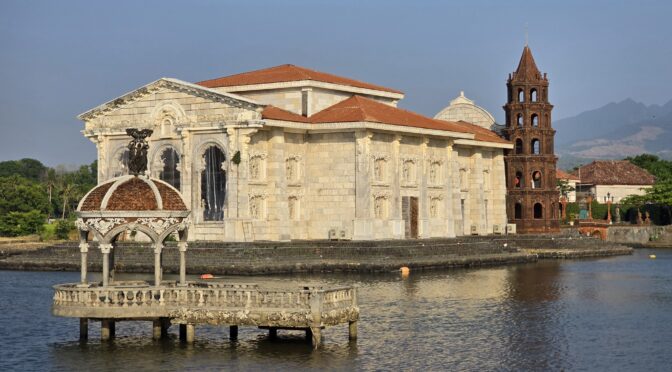 Las Casas Filipinas de Acuzar: Historic Filipino houses and bell tower by the water