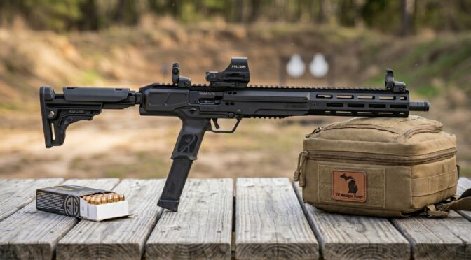 Black Ruger LC Carbine 10mm on wooden table with ammo and tactical bag