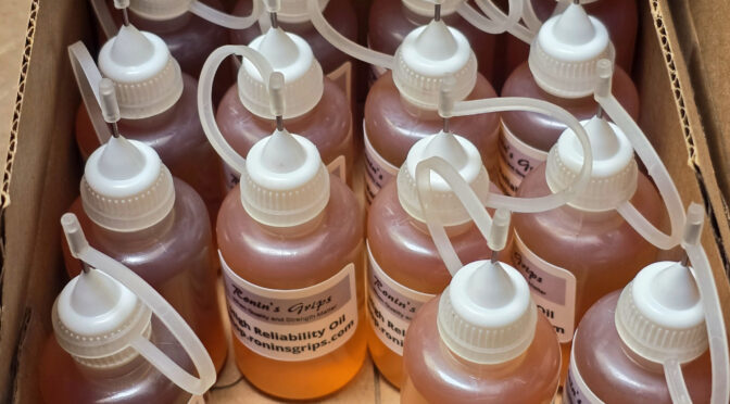 Ronin's Grips reliability oil bottles with white caps and clear applicators